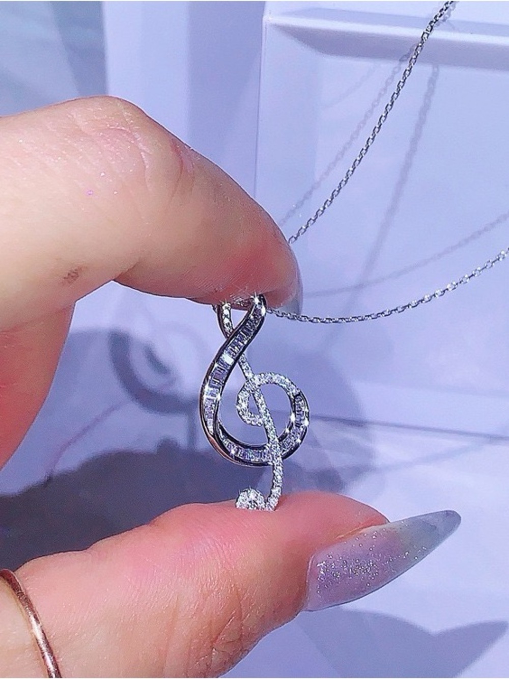Elegant Silver Treble Clef Necklace with Clear Crystals